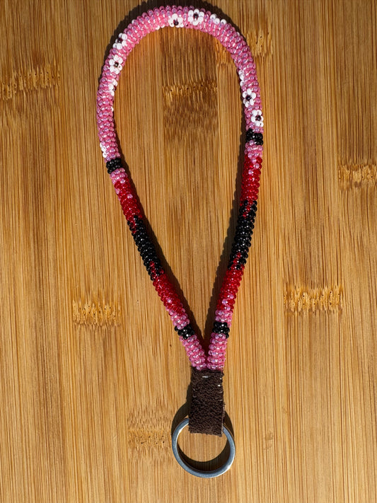 Pink and Red Beaded Wristlet with White Flowers