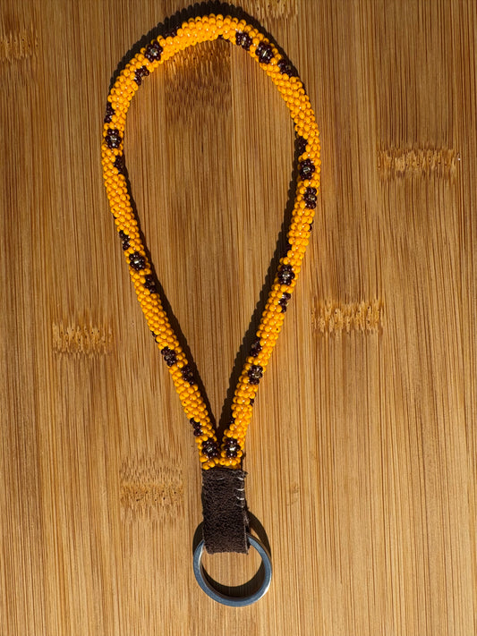 Dark Yellow/Orange Beaded Wristlet with Brown Flowers