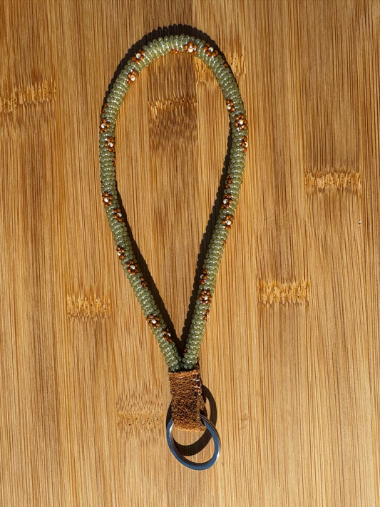 Green Beaded Wristlet with Brown Flowers