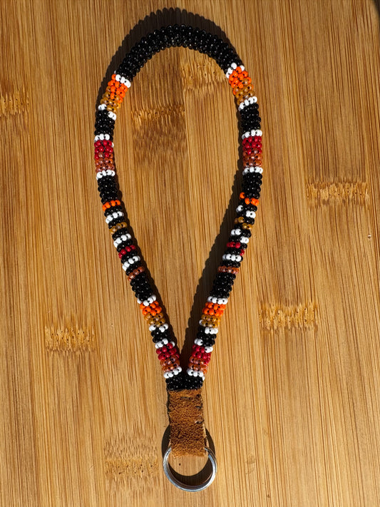 Orange Striped Beaded Wristlet